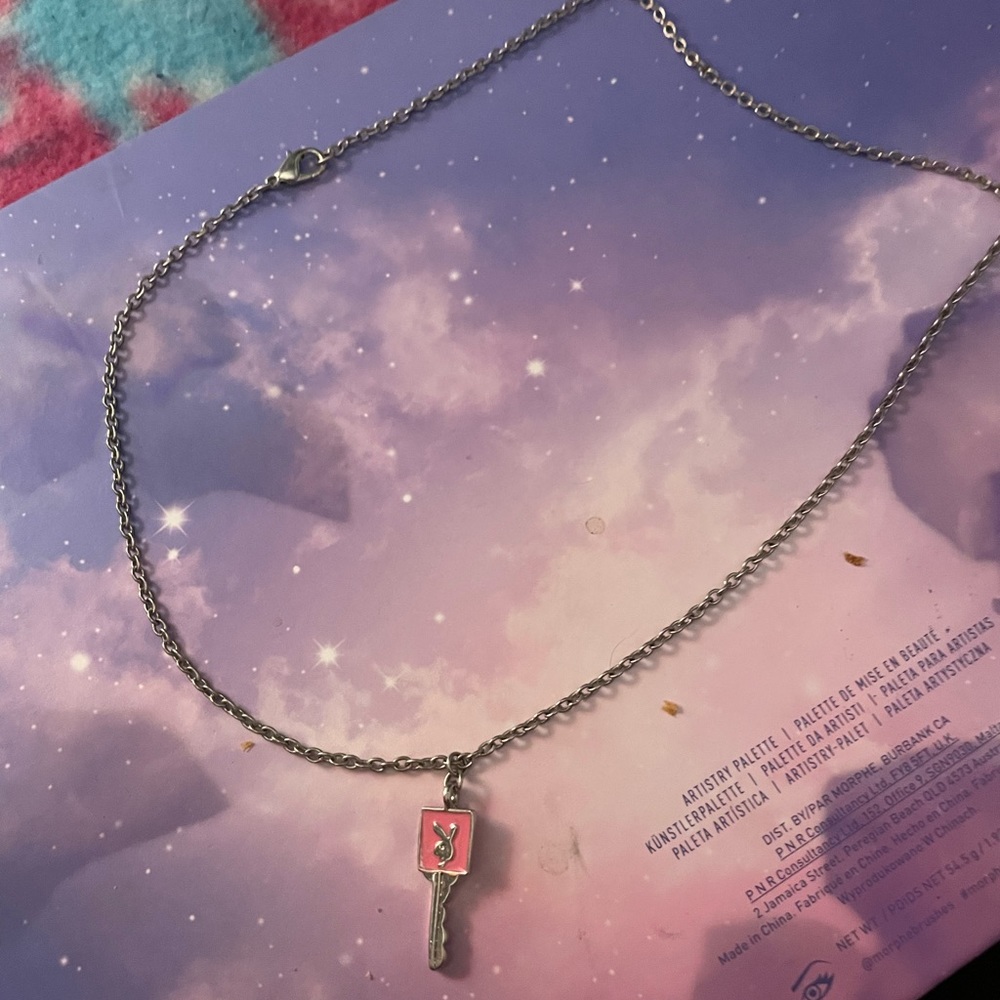 Pink playboy necklace key